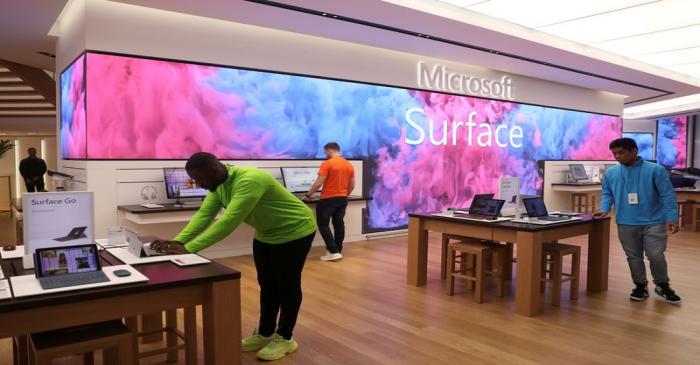 FILE PHOTO: Employees work at Microsoft's new Oxford Circus store ahead of its opening in