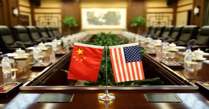 Flags of U.S. and China are placed for a meeting between Secretary of Agriculture Sonny Perdue