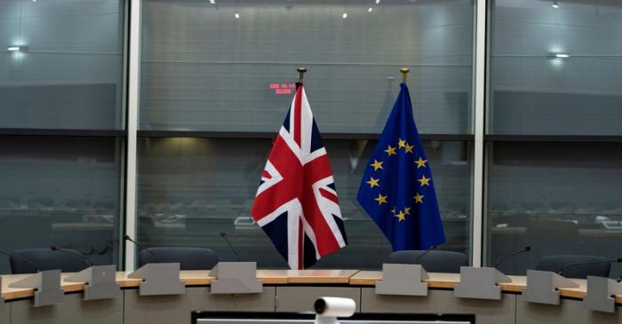 British Union Jack and EU flags are pictured before the meeting with Britain's Brexit Secretary