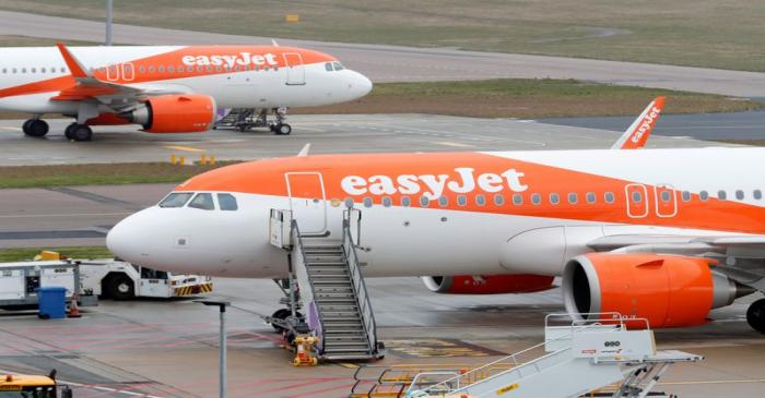 FILE PHOTO: EasyJet planes parked at Luton airport after the airline grounded its entire fleet