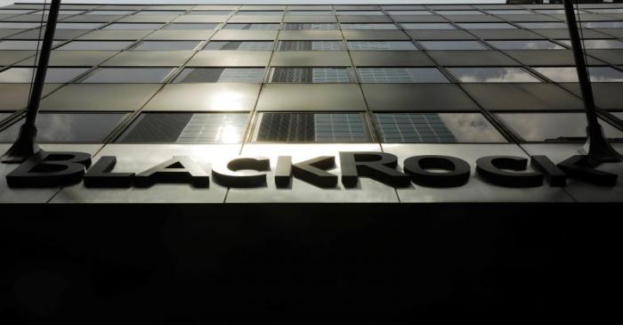 A sign for BlackRock Inc hangs above their building in New York