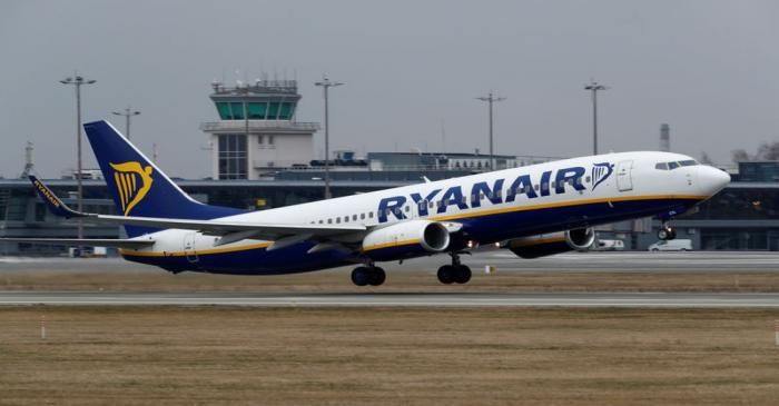 FILE PHOTO: A Ryanair Boeing 737-8AS takes off before all international flights were cancelled