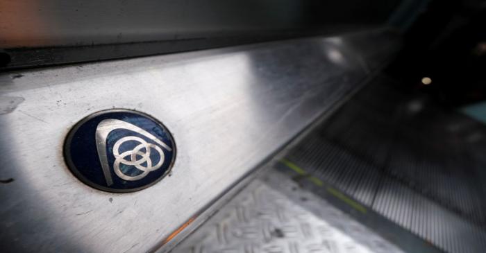 FILE PHOTO: The logo of German steelmaker ThyssenKrupp AG is seen on an escalator at