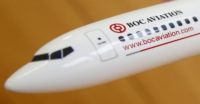 FILE PHOTO: A photo illustration of a BoC Aviation model plane at their office in Singapore