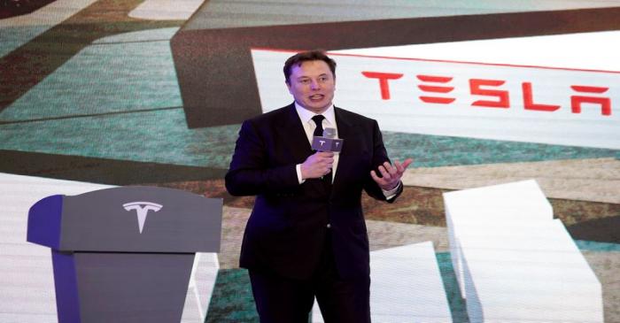 FILE PHOTO: Tesla Inc CEO Elon Musk speaks at an opening ceremony for Tesla China-made Model Y