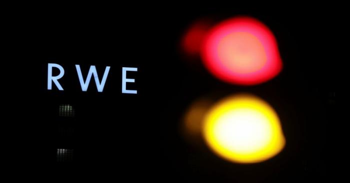 The logo of German utility and and energy supplier RWE is pictured next to a traffic light