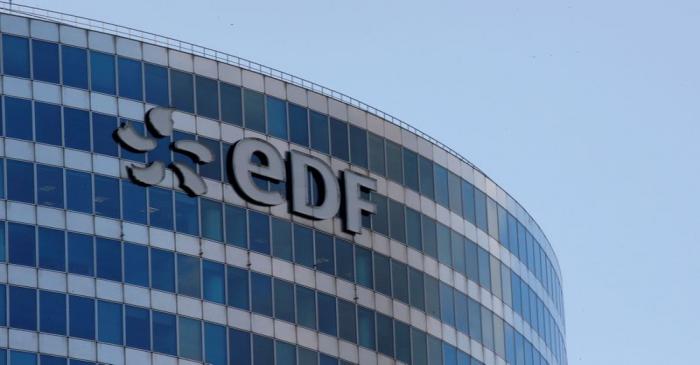 A logo of French electric company EDF is seen at an office building in La Defense business
