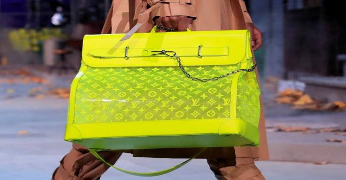 FILE PHOTO: A model presents a bag creation by designer Virgil Abloh during a preview show for