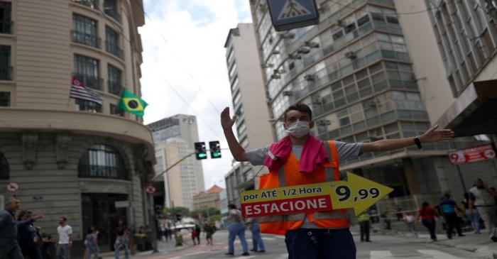 FILE PHOTO: A man wearing protective face mask, as a precautionary measure against coronavirus