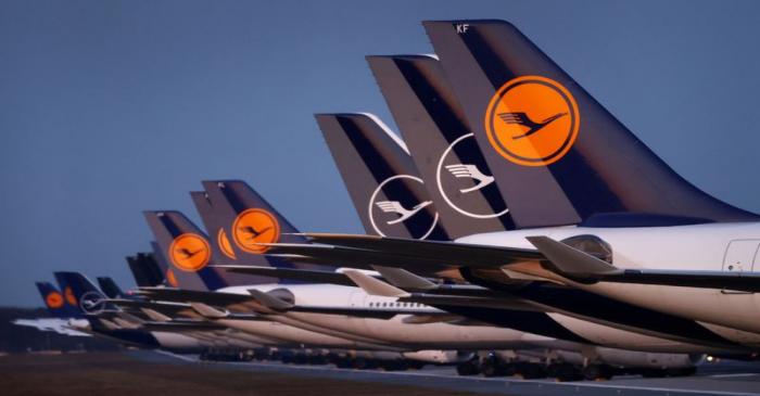 FILE PHOTO: Planes of German carrier Lufthansa are parked on a closed runway in Frankfurt