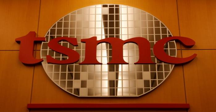 FILE PHOTO: A logo of Taiwan Semiconductor Manufacturing Co (TSMC) is seen at its headquarters