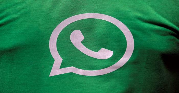 FILE PHOTO: A logo of WhatsApp is pictured on a T-shirt worn by a WhatsApp-Reliance Jio