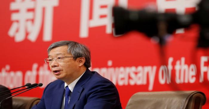 Governor of People's Bank of China (PBOC) Yi Gang attends a news conference on China's economic