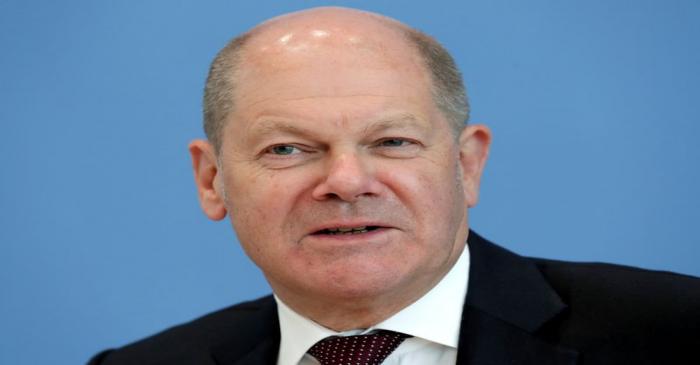 German Finance Minister Olaf Scholz attends a news conference in Berlin