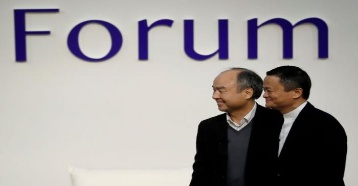 FILE PHOTO: SoftBank Group founder and CEO Masayoshi Son and Alibaba founder and former