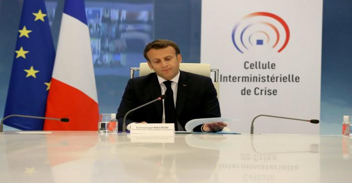 French President Emmanuel Macron takes part in a videoconference with region prefects at the