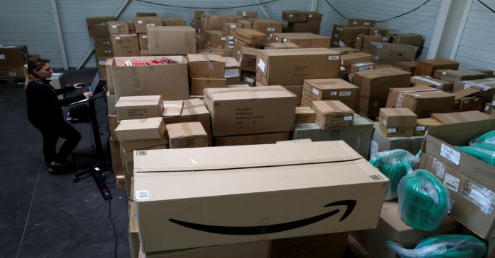 FILE PHOTO: An employee prepares an order for Amazon at Porona warehouse in Bruay-sur-l'Escaut