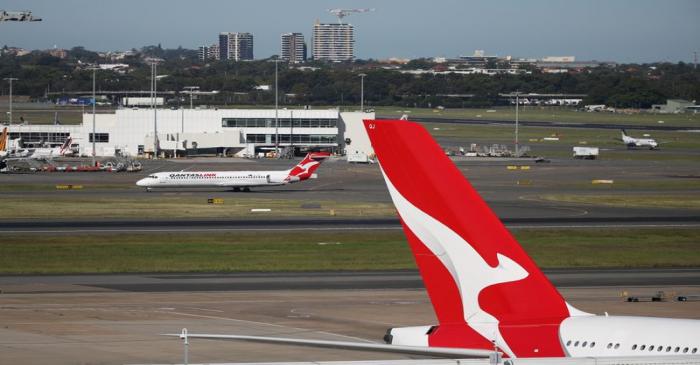 FILE PHOTO: Qantas planes are seen at Kingsford Smith International Airport in Sydney