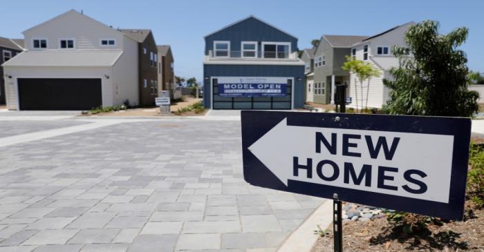 Newly constructed single family homes are shown for sale in Encinitas, California