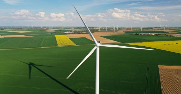 FILE PHOTO: An aerial view shows power-generating windmill turbines in a wind farm in