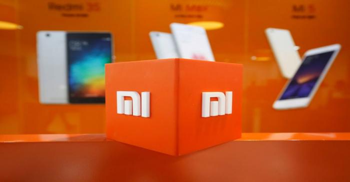 FILE PHOTO: The logo of Xiaomi is seen inside the company's office in Bengaluru, India