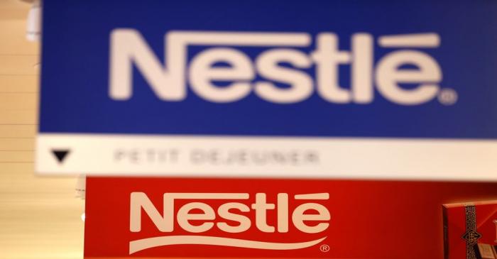 Nestle logos are pictured in the supermarket of Nestle headquarters in Vevey