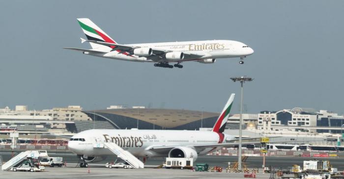 FILE PHOTO: Emirates Airlines Airbus A380 plane approaches for landing at Dubai Airports in