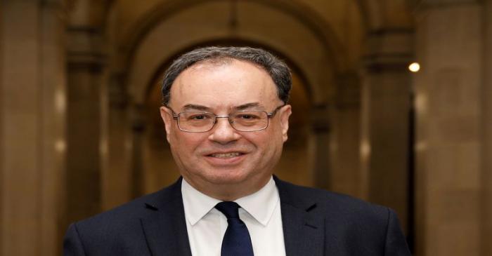 FILE PHOTO: Bank of England Governor Andrew Bailey poses for a photograph on the first day of
