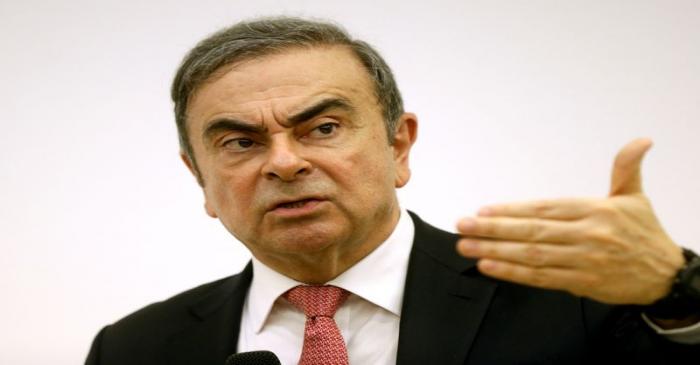FILE PHOTO: Former Nissan chairman Carlos Ghosn gestures during a news conference at the