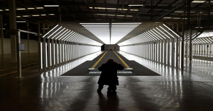 A guest is pictured inside the new Aston Martin Lagonda factory in Saint Athan