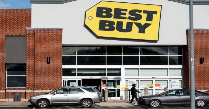 FILE PHOTO: People wait for purchases outside of a Best Buy store due to the outbreak of