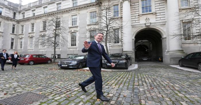 FILE PHOTO: Irish Finance Minister Paschal Donohoe walks outside Government Buildings in Dublin