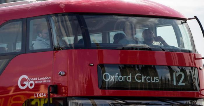 FILE PHOTO: A Go Ahead bus crosses Westminster Bridge in London
