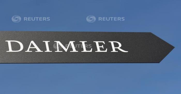 FILE PHOTO: Daimler AG sign is pictured at the IAA truck show in Hanover