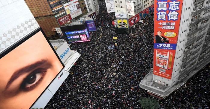 FILE PHOTO: File photo of people attending a Human Rights Day march in Hong Kong