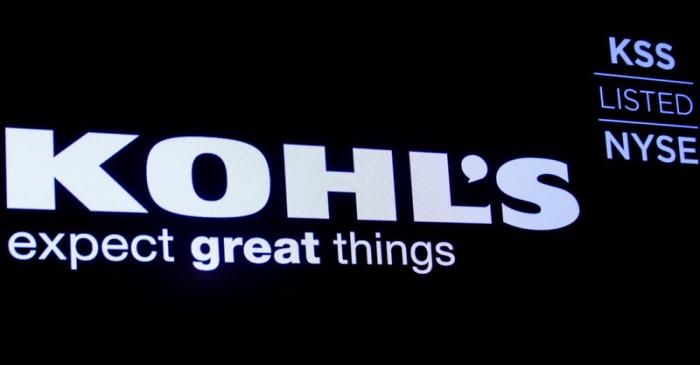 The logo and trading informations for Kohl's  is displayed on a screen on the floor at the NYSE