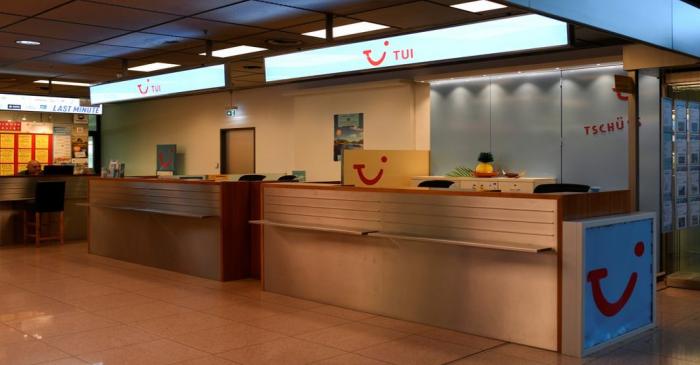 A closed counter of the German travel company TUI is seen at the Helmut-Schmidt-Airport during