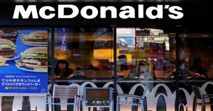 Visitors are seen inside a McDonald's store in Tokyo