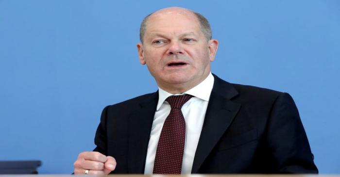 German Finance Minister Olaf Scholz attends a news conference in Berlin