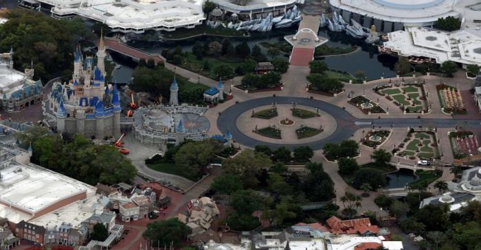 FILE PHOTO: Disney's Magic Kingdom theme park sits empty after it closed in an effort to combat