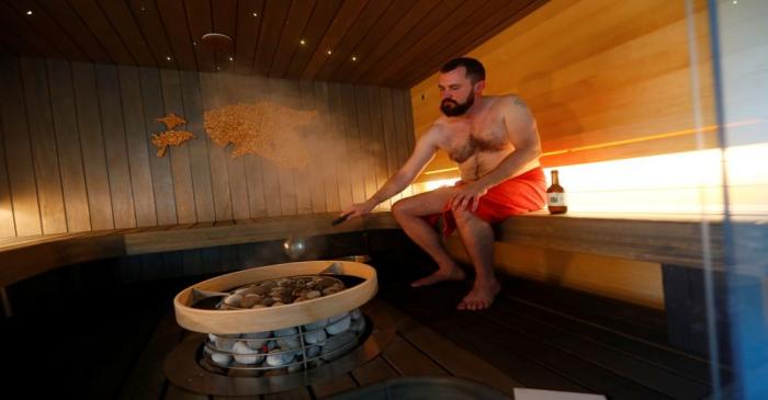 EstonianSaunas company owner Rang enjoys sauna in Kunka