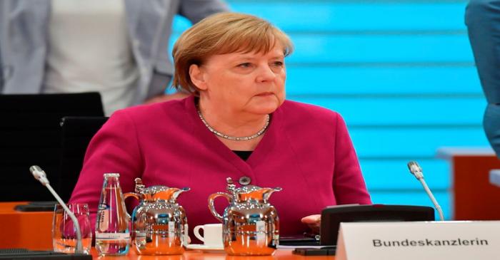 German Chancellor Angela Merkel looks on at the start of the weekly cabinet meeting in Berlin
