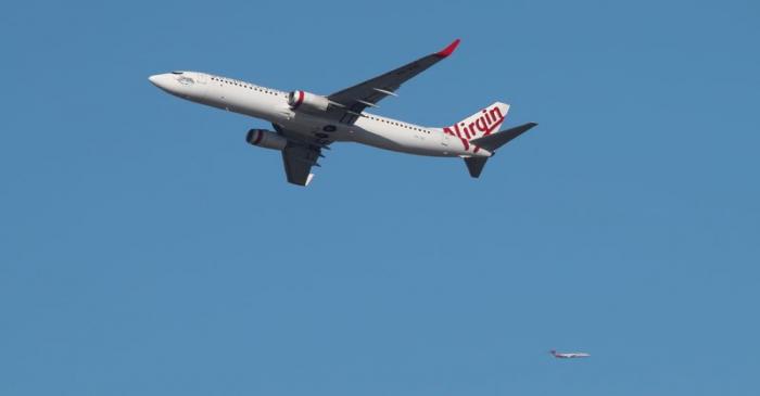 FILE PHOTO: A Virgin Australia Airlines plane takes off from Kingsford Smith International