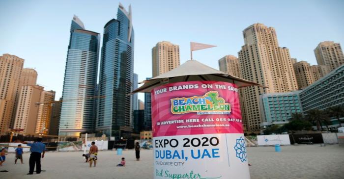 A booth is seen on a beach in Dubai carrying the Expo 2020 logo