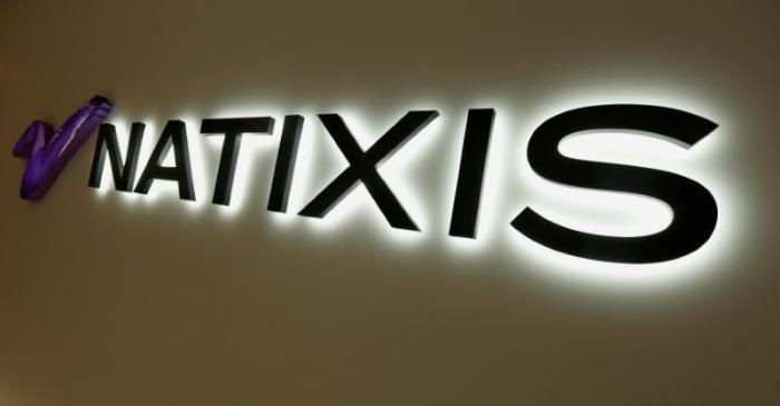 FILE PHOTO: The logo of Natixis is displayed at the company's office in Hong Kong
