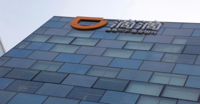 Logo of Didi Chuxing is seen at its headquarters building in Beijing