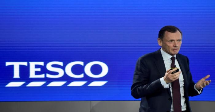 FILE PHOTO: Tesco Chief Financial Officer, Alan Stewart speaks at an analyst presentation in