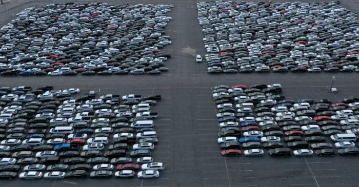 FILE PHOTO: Unused rental cars fill the Dodger Stadium parking lot as the spread of the