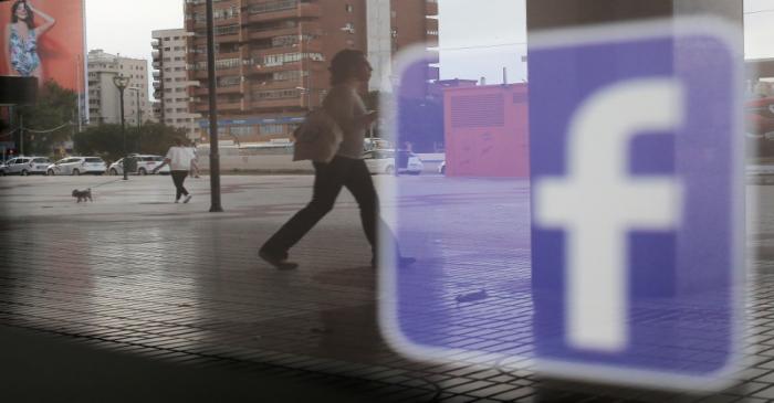 FILE PHOTO: Facebook logo is seen on a shop window in Malaga