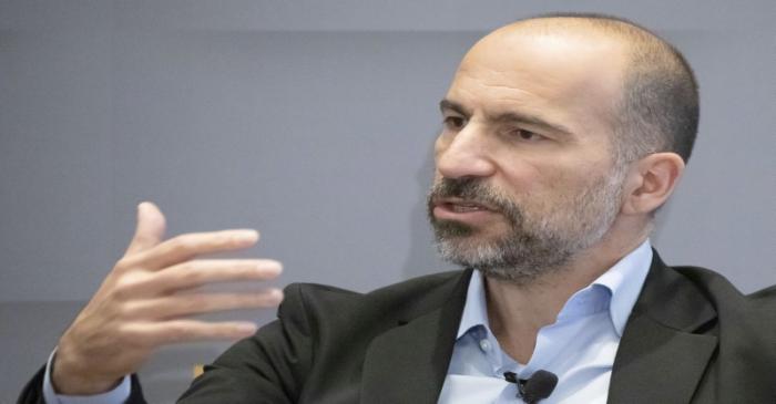 Uber CEO Dara Khosrowshahi gestures as he speaks during a meeting with the Economic Club of New